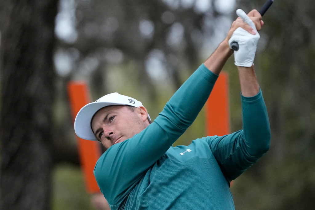 Jordan Spieth hits off the 12th tee during the second round of The Players Championship golf tournament Friday, March 13, 2026, in Ponte Vedra Beach, Fla. (AP Photo/Gerald Herbert)