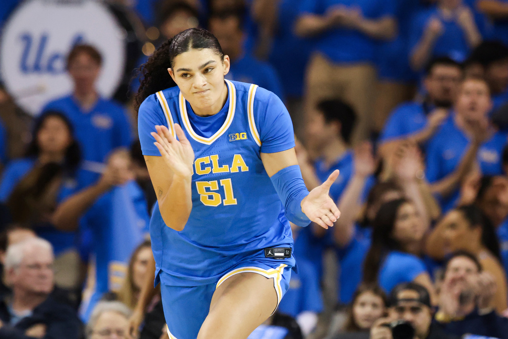 UCLA center Lauren Betts reacts after scoring a basket during the first half of an NCAA college basketball game against Southern California, Saturday, Jan. 3, 2026, in Los Angeles. (AP Photo/Jessie Alcheh)