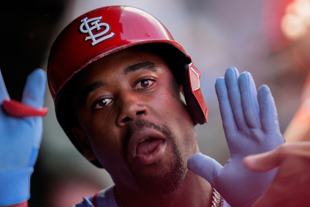 St. Louis Cardinals' Jordan Walker (18) celebrates in the dugout after hitting a two-run home run during the seventh inning of a baseball game against the Chicago Cubs, Saturday, Sept. 27, 2025, in Chicago. (AP Photo/Erin Hooley)