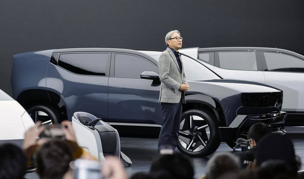 Honda Chief Executive Toshihiro Mibe speaks to the media at Tokyo Mobility Show during a media day at Tokyo Big Sight in Tokyo, on Wednesday, Oct. 29, 2025. (Daiki Katagiri/Kyodo News via AP)