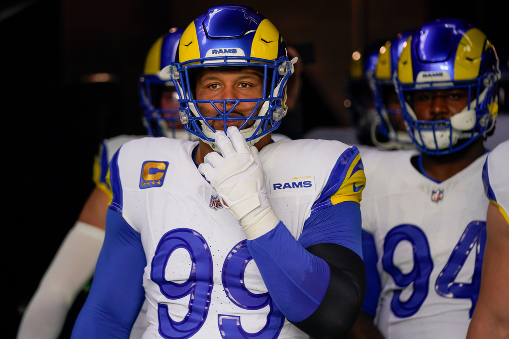 FILE - Los Angeles Rams defensive tackle Aaron Donald (99) waits to take the field before an NFL football game against the New York Giants, Sunday, Dec. 31, 2023, in East Rutherford, N.J. (AP Photo/Seth Wenig, File)