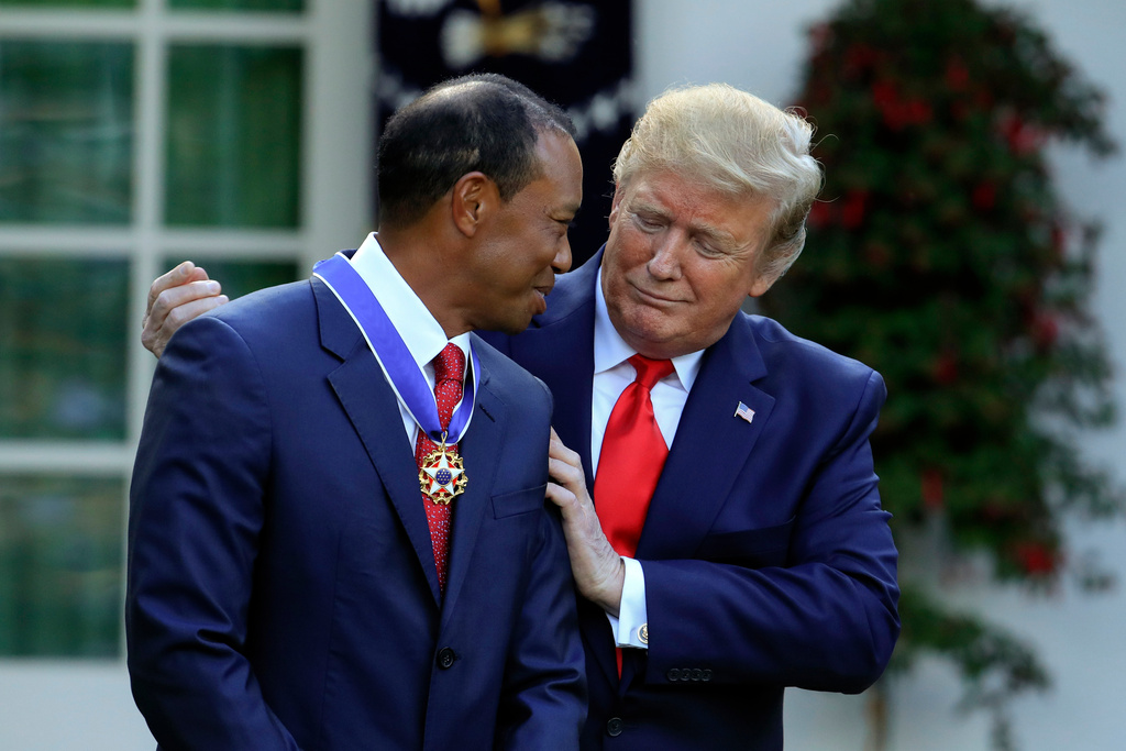 FILE - President Donald Trump presents the Presidential Medal of Freedom to Tiger Woods during a ceremony in the Rose Garden of the White House in Washington, Monday, May 6, 2019. (AP Photo/Manuel Balce Ceneta, File)