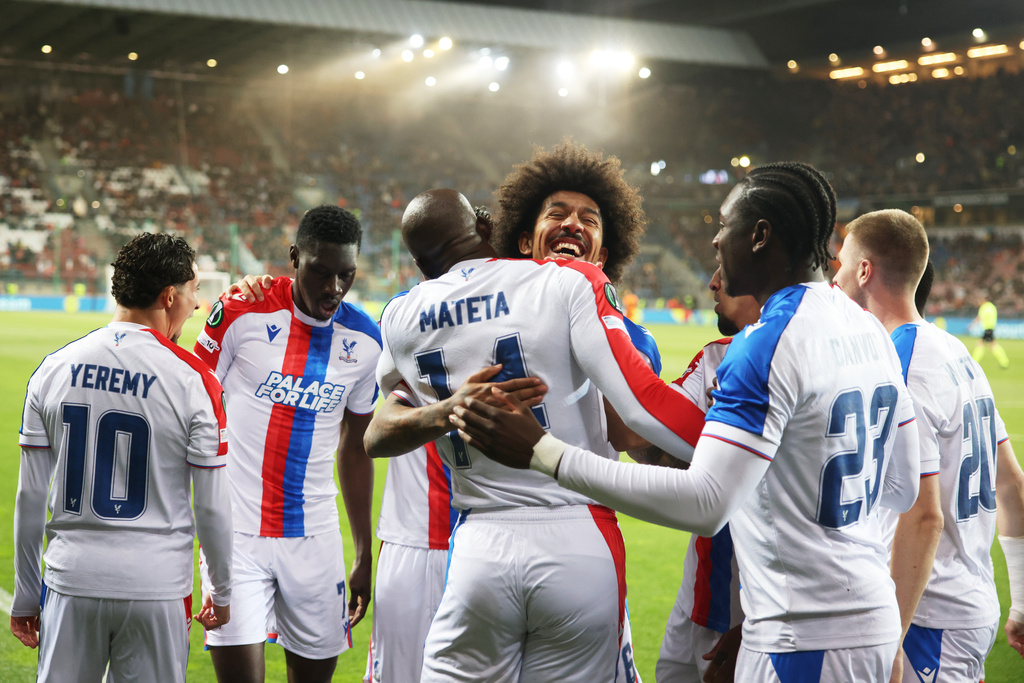 Crystal Palace players celebrate after Crystal Palace's Ismaila Sarr scored his side's opening goal during the Conference League semi-final, first leg soccer match between Shakhtar and Crystal Palace in Krakow, Poland, Thursday, April 30, 2026. (AP Photo/Beata Zawrzel)