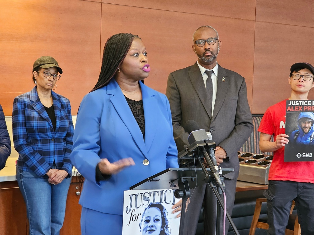 Minnesota civil rights activist Nekima Levy Armstrong, center left, and Jaylani Hussein, executive director of the Minnesota chapter of the Council on Islamic-American Relations, speak at a news conference in Minneapolis on Friday, March 6, 2026, on the ouster of Kristi Noem as secretary of the Department of Homeland Security. (AP Photo/Steve Karnowski)
