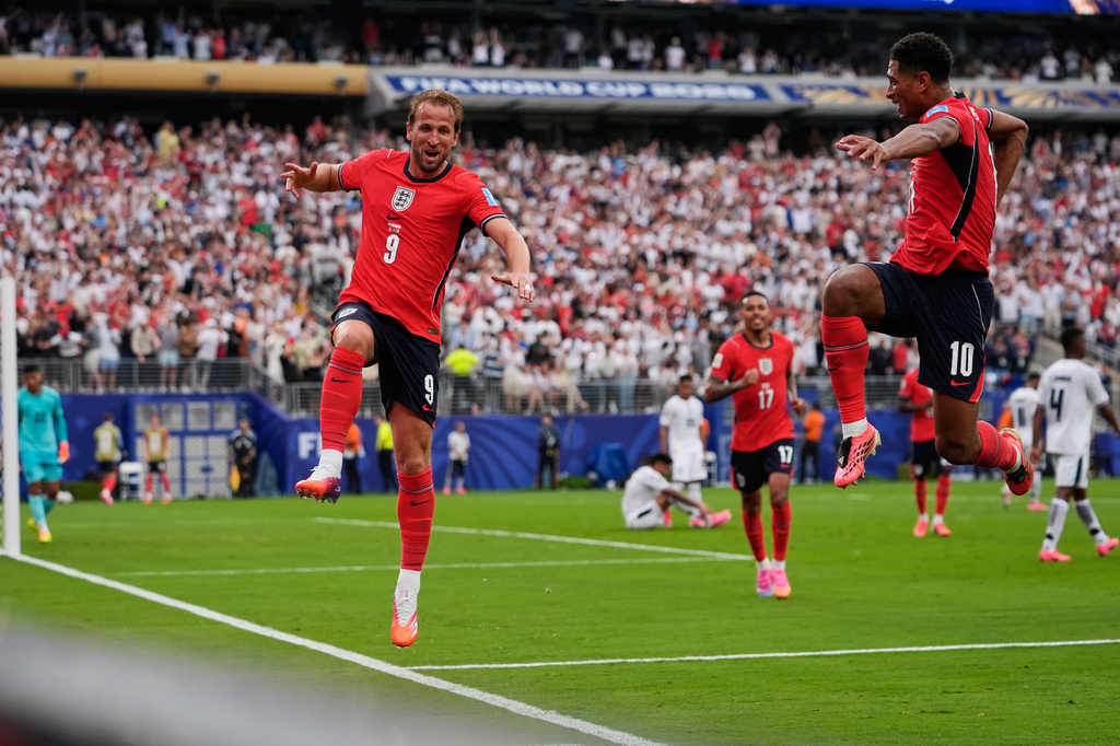 England’s Harry Kane (9) celebrates with England's Jude Bellingham (10) after scoring their second goal during the World Cup Group L soccer match between Panama and England in East Rutherford, N.J., near New York, Saturday, June 27, 2026. (AP Photo/Steve Luciano)
