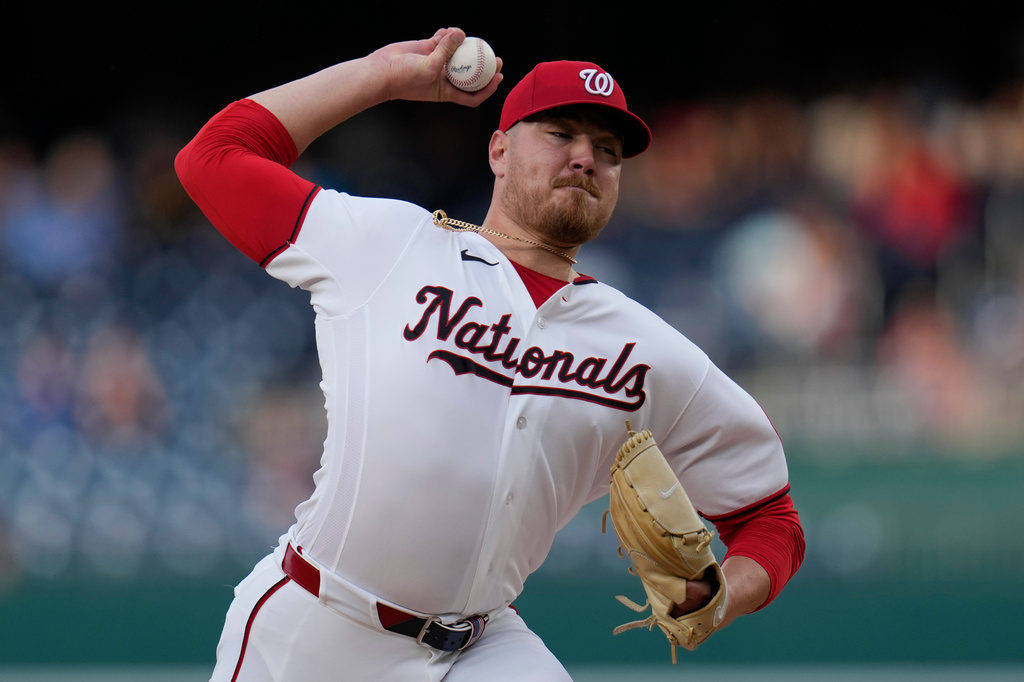 Washington Nationals starting pitcher Cade Cavalli throws to the Minnesota Twins during the first inning of a baseball game, Tuesday, May 5, 2026, in Washington. (AP Photo/Jess Rapfogel)