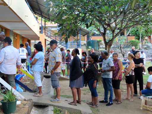 People line up to cast their votes in a runoff presidential election at Mont Fleuri Secondary School, Mont Fleuri, Mahe, Seychelles, Saturday, Oct. 11, 2025. (AP Photo/Emilie Chetty) People line up to cast their votes in a runoff presidential election at Mont Fleuri Secondary School, Mont Fleuri, Mahe, Seychelles, Saturday, Oct. 11, 2025. (AP Photo/Emilie Chetty)