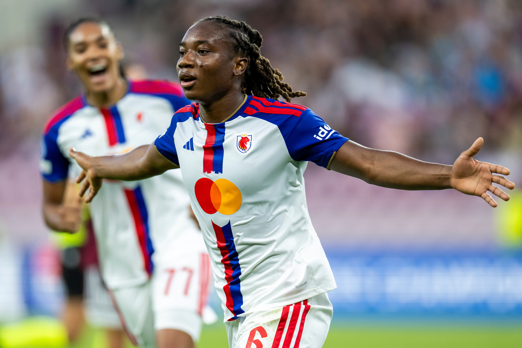 OL Lyonnes' Melchie Dumornay celebrates during a UEFA Women's Champions League soccer match against Servette FC Chenois in Geneva, Switzerland, Wednesday, Sept. 23, 2026. (Martial Trezzini/Keystone via AP)