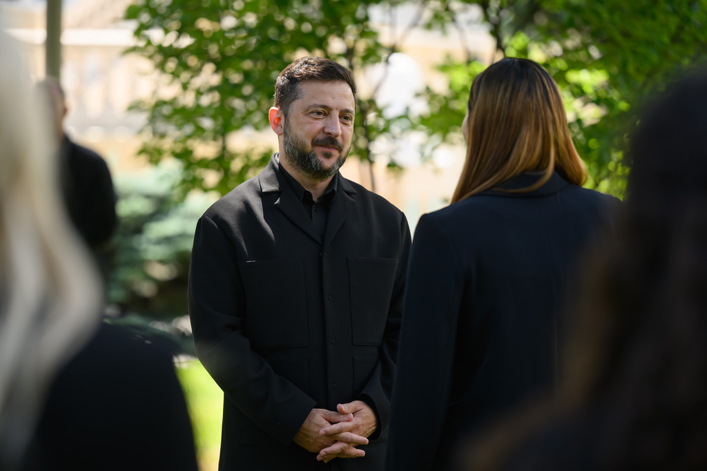 In this photo provided by the Ukrainian Presidential Press Office, Ukrainian President Volodymyr Zelenskyy, center left, speaks with Laura Loomer Thursday July 23, 2026, in Kyiv, Ukraine. (Ukrainian Presidential Press Office via AP)