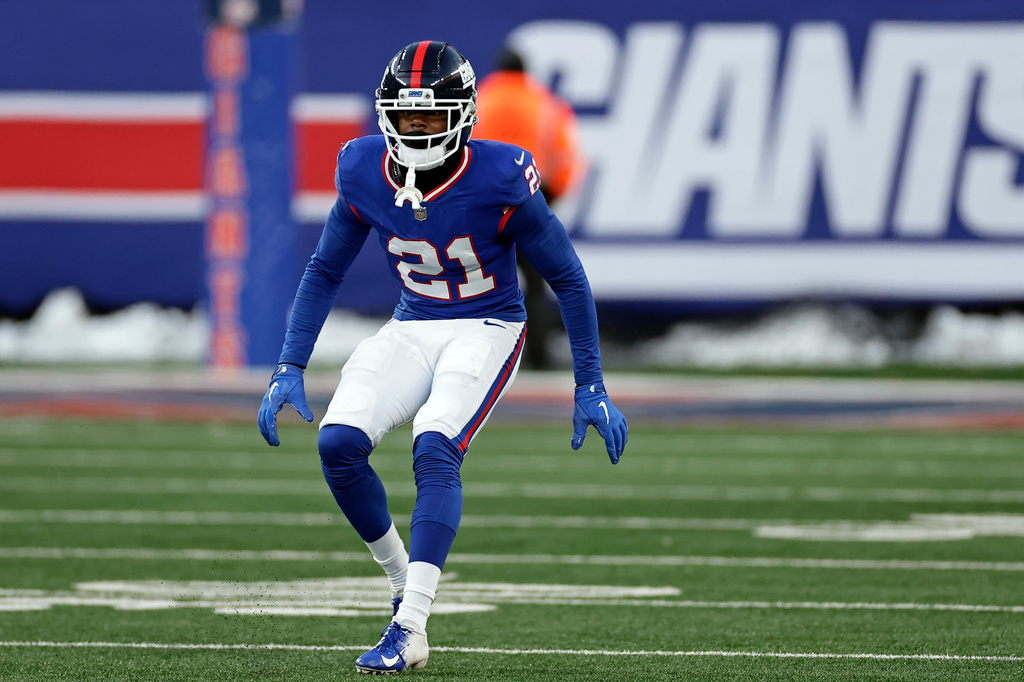 FILE - New York Giants cornerback Paulson Adebo (21) defends during an NFL football game against the Washington Commanders, Dec. 14, 2025, in East Rutherford, N.J. (AP Photo/Adam Hunger, File)