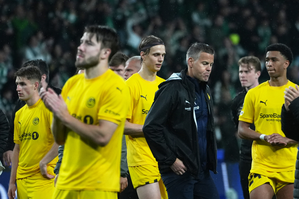 Bodo Glimt players are dejected at the end of a Champions League round of 16 second leg soccer match between Sporting CP and Bodo Glimt in Lisbon, Portugal, Tuesday, March 17, 2026. (AP Photo/Ana Brigida)