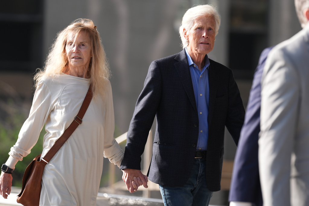 Suzanne Morrison, mother of Matthew Perry, walks into court with her husband Keith Morrison before Jasveen Sangha, who plead guilty to selling Perry a lethal dose of the drug ketamine in the days before his death, appears in court for sentencing on Wednesday, April 8, 2026 in Los Angeles. (AP Photo/Damian Dovarganes)