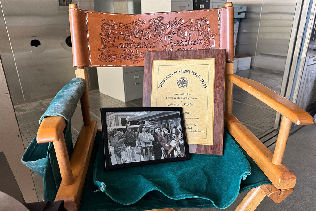 Lawrence Kasdan’s director chair is on display, along with a framed photo of him on set and his Writers Guild award, on University of Michigan campus, Nov. 24, 2025, in Ann Arbor, Mich. (AP Photo/Mike Householder)