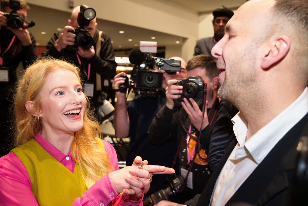 CORRECTS DATE - Greens Party candidate Hannah Spencer, left, stands with party leader Zack Polanski after winning the Gorton and Denton by-election, Manchester, England, Friday, Feb. 27, 2026. (AP Photo/Jon Super)