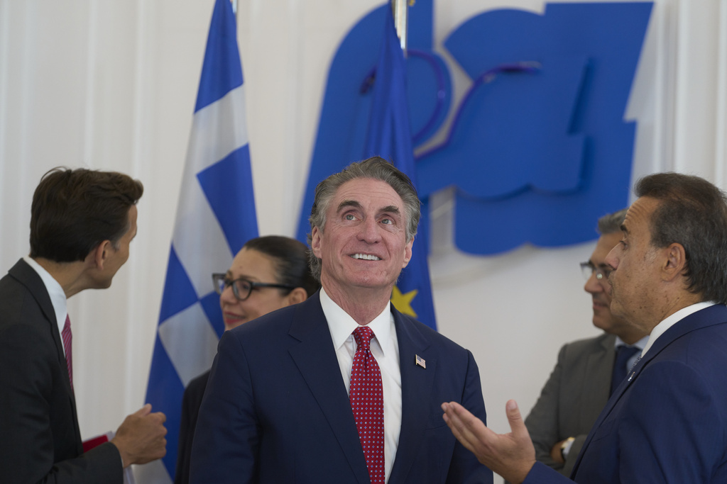 U.S. Secretary of the Interior Doug Burgum arrives at the Maximou Mansion in Athens, for a meeting with Greek Prime Minister Kyriakos Mitsotakis, Thursday, Sept. 11, 2025. (AP Photo/Petros Giannakouris)