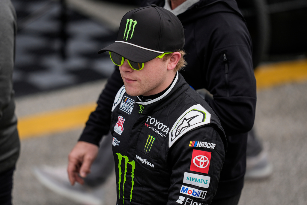 Driver Ty Gibbs walks in the pit area during a NASCAR Daytona 500 practice, Wednesday, Feb. 11, 2026, in Daytona, Fla. (AP Photo/Mike Stewart)