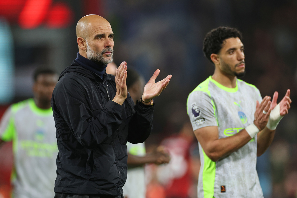 Manchester City's head coach Pep Guardiola applauds supporters after the English Premier League soccer match between AFC Bournemouth and Manchester City in Bournemouth, England, Tuesday, May 19, 2026. (AP Photo/Ian Walton)