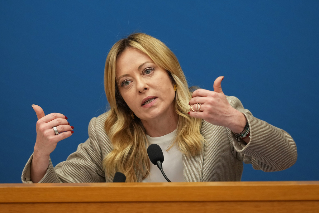 Italian Prime Minister Giorgia Meloni holds her annual start-of-the-year press conference in the press room at the Lower Chamber, in Rome, Friday, Jan. 9, 2026. (AP Photo/Andrew Medichini)