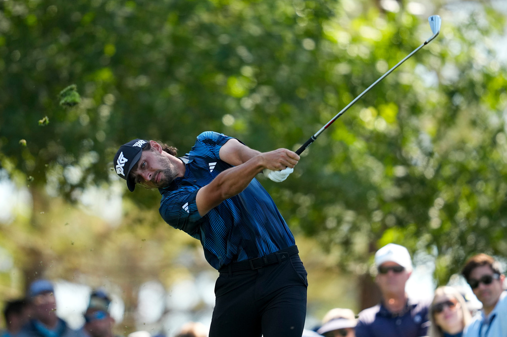FILE - Marco Penge, of England, watches his tee shot on the fourth hole during the second round of the Masters golf tournament at the Augusta National Golf Club, April 10, 2026, in Augusta, Ga. (AP Photo/Ashley Landis, File)