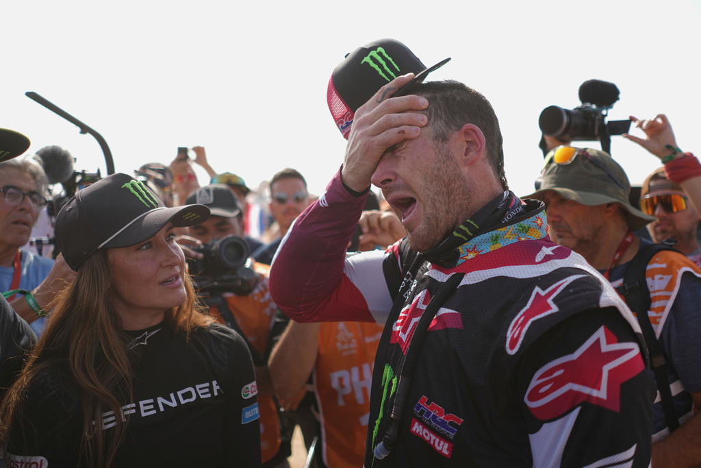 Rider Ricky Brabec of the U.S. reacts after the thirteenth stage with a start and finish in Yanbu, Saudi Arabia, Saturday, Jan.17, 2026. (AP Photo/Thibault Camus)