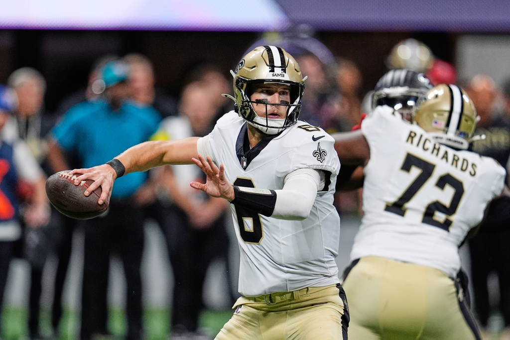 New Orleans Saints quarterback Tyler Shough (6) passes against the Atlanta Falcons in the first half of an NFL football game, Sunday, Jan. 4, 2026, in Atlanta. (AP Photo/Mike Stewart)