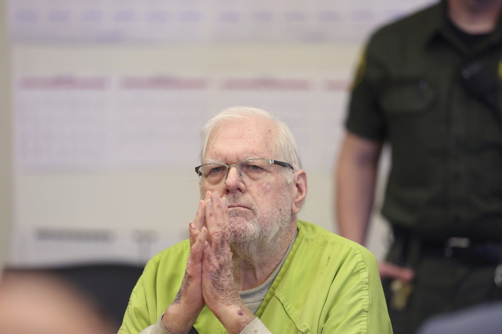 Orange County Superior Court Judge Jeffrey Ferguson reacts as he listens to victim impact statements while appearing for sentencing after his second-degree murder conviction for shooting his wife following an hours-long argument at the Central Justice Center in Santa Ana, Calif., Wednesday, Sept. 17, 2025. (Allen J. Schaben/Los Angeles Times via AP, Pool)