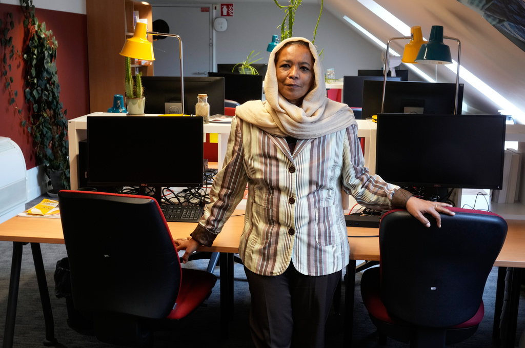 Archaeologist from Sudan's National Museum Dr Shadia Abdrabo, poses at her office at the French National Institute for Art History (INHA) in Paris, Wednesday, Oct. 29, 2025. (AP Photo/Michel Euler)