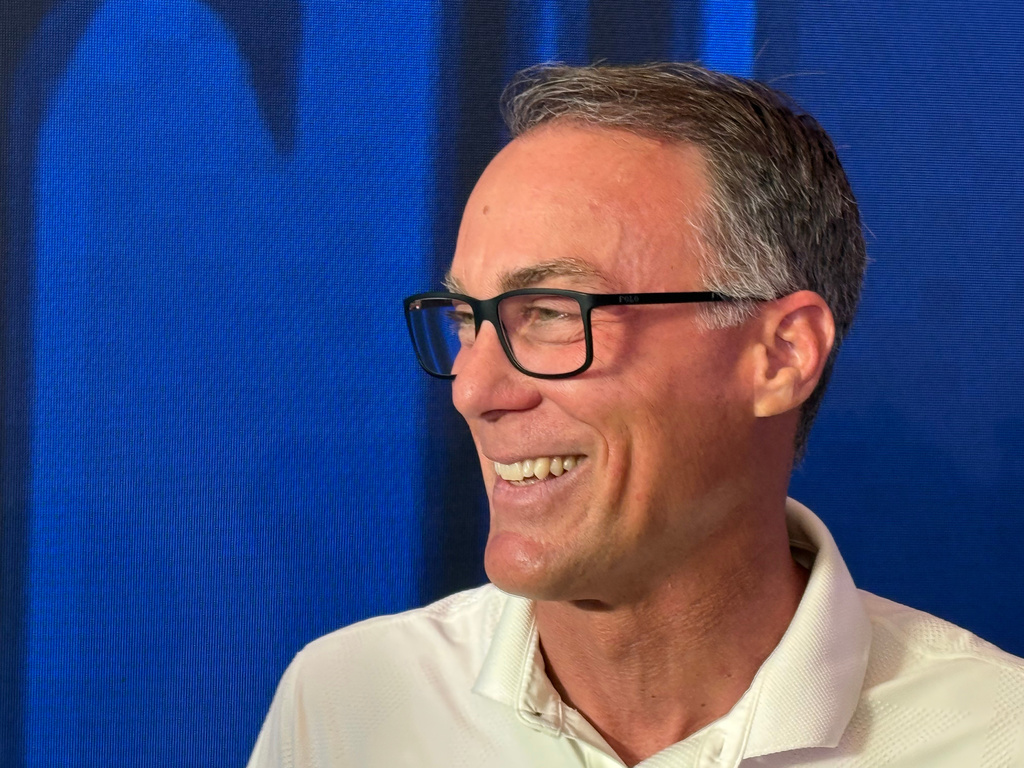 Kevin Harvick, who captured the 2014 NASCAR Cup Series championship and won 60 races at the sport’s top level, smiles after he was selected to the NASCAR Hall of Fame, Tuesday, May 19, 2026, in Charlotte, N.C. (AP Photo/Steve Reed)