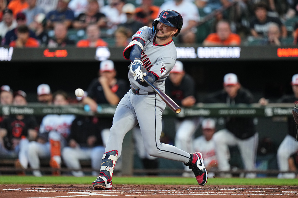 Cleveland Guardians' Patrick Bailey hits an RBI single during the second inning of a baseball game against the Baltimore Orioles, Tuesday, Sept. 8, 2026, in Baltimore. (AP Photo/Stephanie Scarbrough)