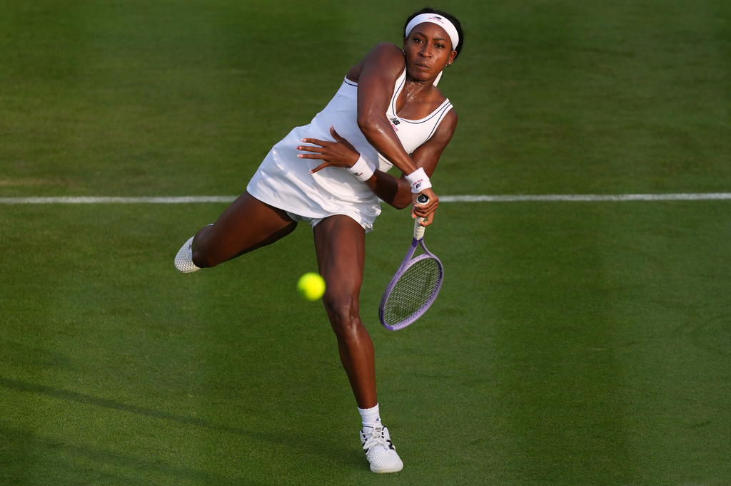 Coco Gauff of the United States plays a return to Tamara Korpatsch of Germany during the women's singles at the Wimbledon Tennis Championships in London, Monday, June 29, 2026.(AP Photo/Kirsty Wigglesworth)
