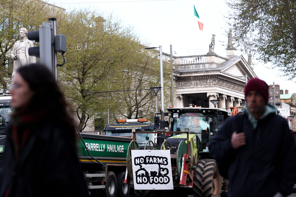 Tractors block O'Connell Street on the fifth day of the National Fuel Protest, in Dublin, Ireland, Saturday, April 11, 2026. (AP Photo/Peter Morrison)