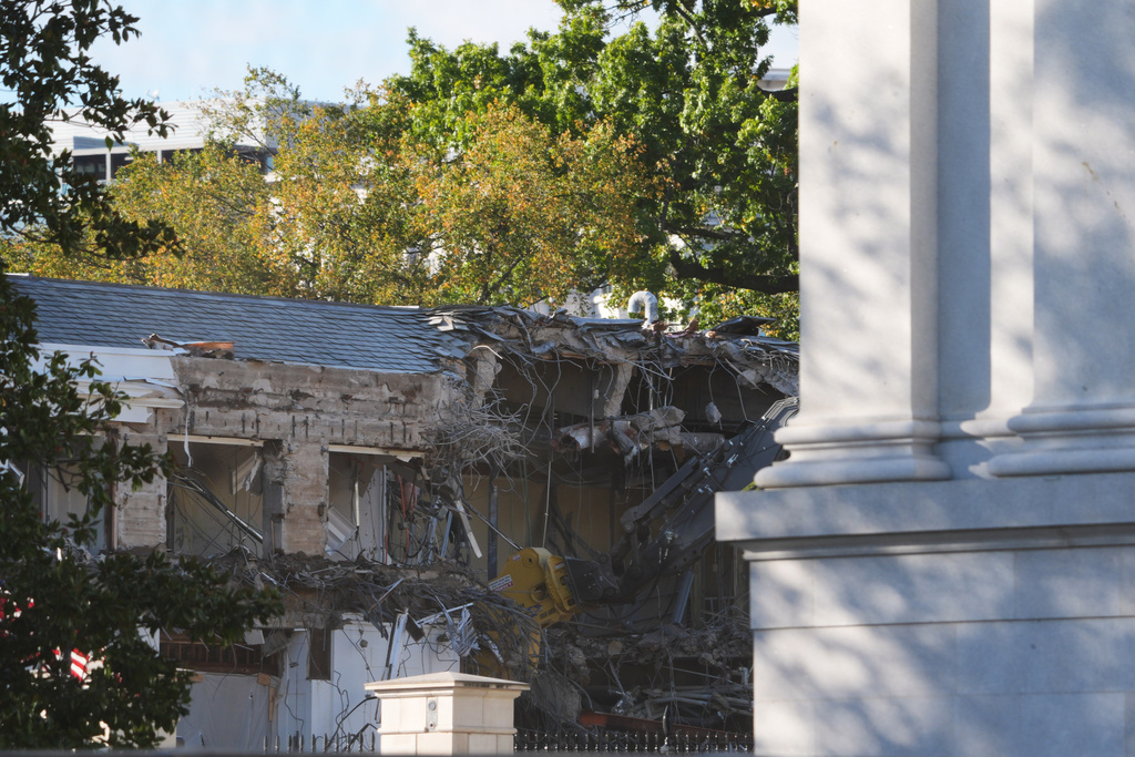 Work begins on the demolition of a part of the East Wing of the White House, Monday, Oct. 20, 2025, in Washington, before construction of a new ballroom. (AP Photo/Evan Vucci)