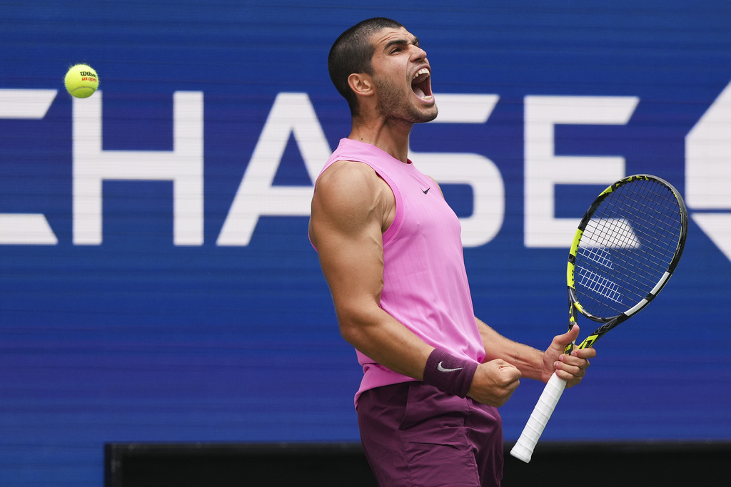 Carlos Alcaraz, of Spain, reacts after defeating Jiri Lehecka, of the Czech Republic, during the quarterfinal round of the U.S. Open tennis championships, Tuesday, Sept. 2, 2025, in New York. (AP Photo/Kirsty Wigglesworth)