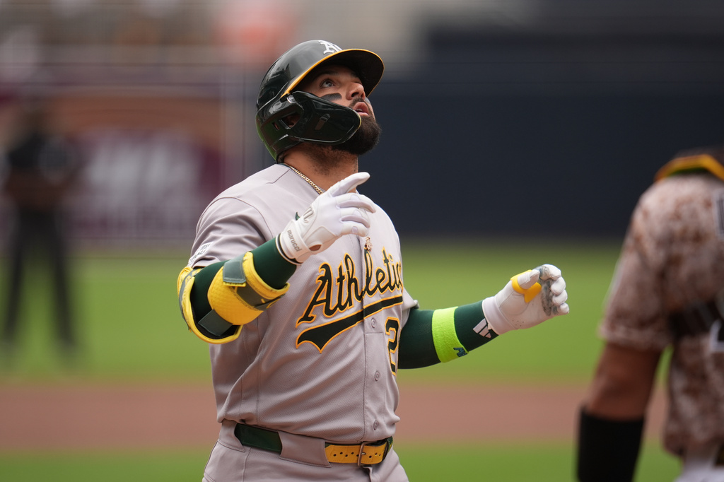 Athletics' Carlos Cortes celebrates after hitting a home run during the first inning of a baseball game against the San Diego Padres Sunday, May 24, 2026, in San Diego. (AP Photo/Gregory Bull)