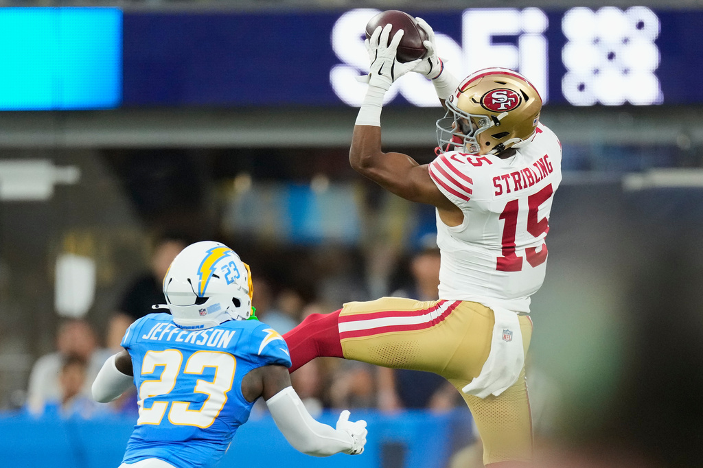 San Francisco 49ers wide receiver De'Zhaun Stribling (15) catches a pass against Los Angeles Chargers defensive back Tony Jefferson (23) during the first half of a preseason NFL football game, Thursday, Aug. 20, 2026, in Inglewood, Calif. (AP Photo/Mark J. Terrill)