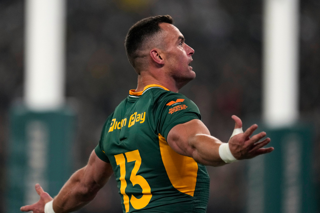 South Africa's Jesse Kriel celebrates after scoring a try during a third international test rugby match between South Africa and New Zealand, in Johannesburg, South Africa, Saturday, Sept. 5, 2026. (AP Photo/Themba Hadebe)