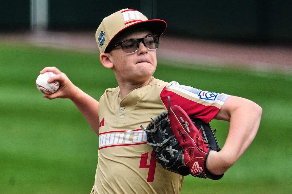 Henderson, Nev.'s Payton Hinsen delivers during the first inning of the Little League World Series Championship game against Curacao in South Williamsport, Pa., Sunday, Aug. 30, 2026. (AP Photo/Gene J. Puskar)
