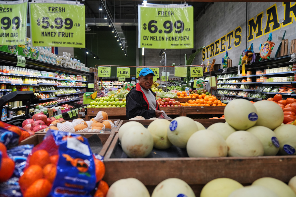 A person shops for produce, which is covered by the USDA Supplemental Nutrition Assistance Program (SNAP), at a grocery store in Baltimore, Thursday, Oct. 30, 2025. (AP Photo/Stephanie Scarbrough)