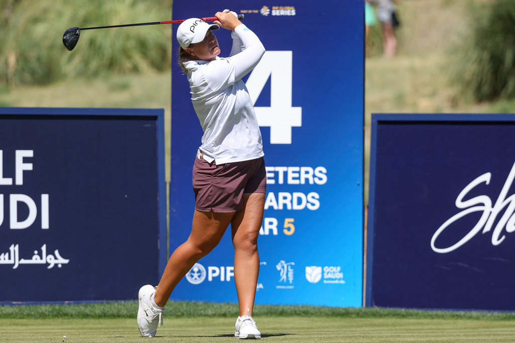 Lauren Coughlin hits a tee shot on the fourth hole during the final round of the Aramco Championship golf tournament Sunday, April 5, 2026, in North Las Vegas, Nev. (AP Photo/Ian Maule)