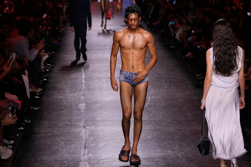 Models wear creations part of the Diesel women's Spring-Summer 2027 collection presented in Milan, Italy, Tuesday, Sept. 22, 2026. (AP Photo/Luca Bruno).