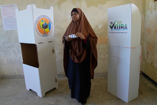 A woman casts her vote during the general elections at Mpendaye polling station in Zanzibar, Tanzania, Wednesday, Oct. 29, 2025. (AP Photo/Brian Inganga) A woman casts her vote during the general elections at Mpendaye polling station in Zanzibar, Tanzania, Wednesday, Oct. 29, 2025. (AP Photo/Brian Inganga)