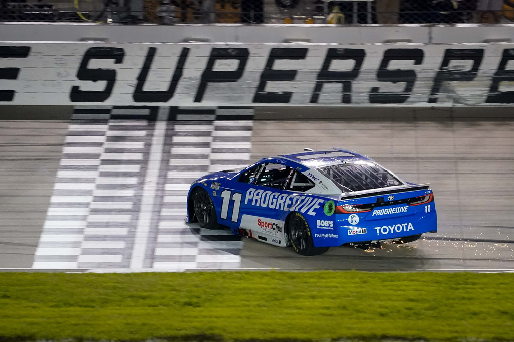 Denny Hamlin does a burnout after winning a NASCAR Cup Series auto race, Sunday, May 31, 2026, in Lebanon, Tenn. (AP Photo/Camden Hall)