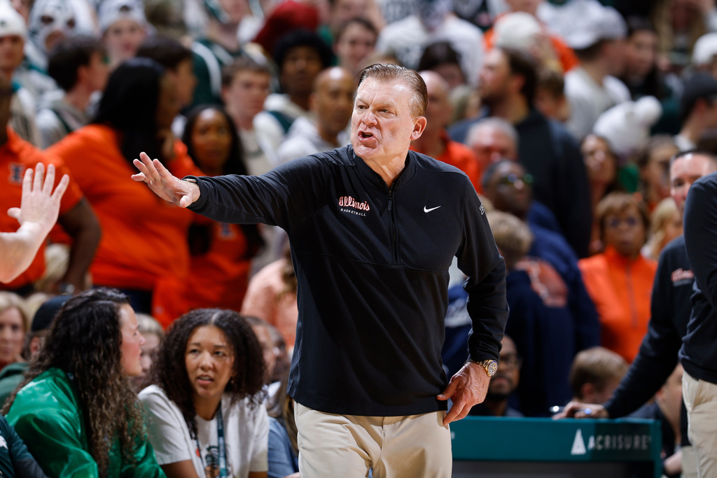 Illinois coach Brad Underwood gestures during the first half of an NCAA college basketball game against Michigan State, Saturday, Feb. 7, 2026, in East Lansing, Mich. (AP Photo/Al Goldis)
