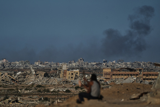 Smoke rises following an Israeli military strike in Gaza City, as seen from the central Gaza Strip, Tuesday, Oct. 7, 2025. (AP Photo/Abdel Kareem Hana) Smoke rises following an Israeli military strike in Gaza City, as seen from the central Gaza Strip, Tuesday, Oct. 7, 2025. (AP Photo/Abdel Kareem Hana)
