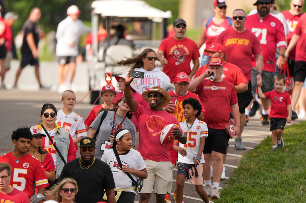 Fans arrive for the Kansas City Chiefs' NFL football training camp Saturday, Aug. 1, 2026, in St. Joseph, Mo. (AP Photo/Charlie Riedel)