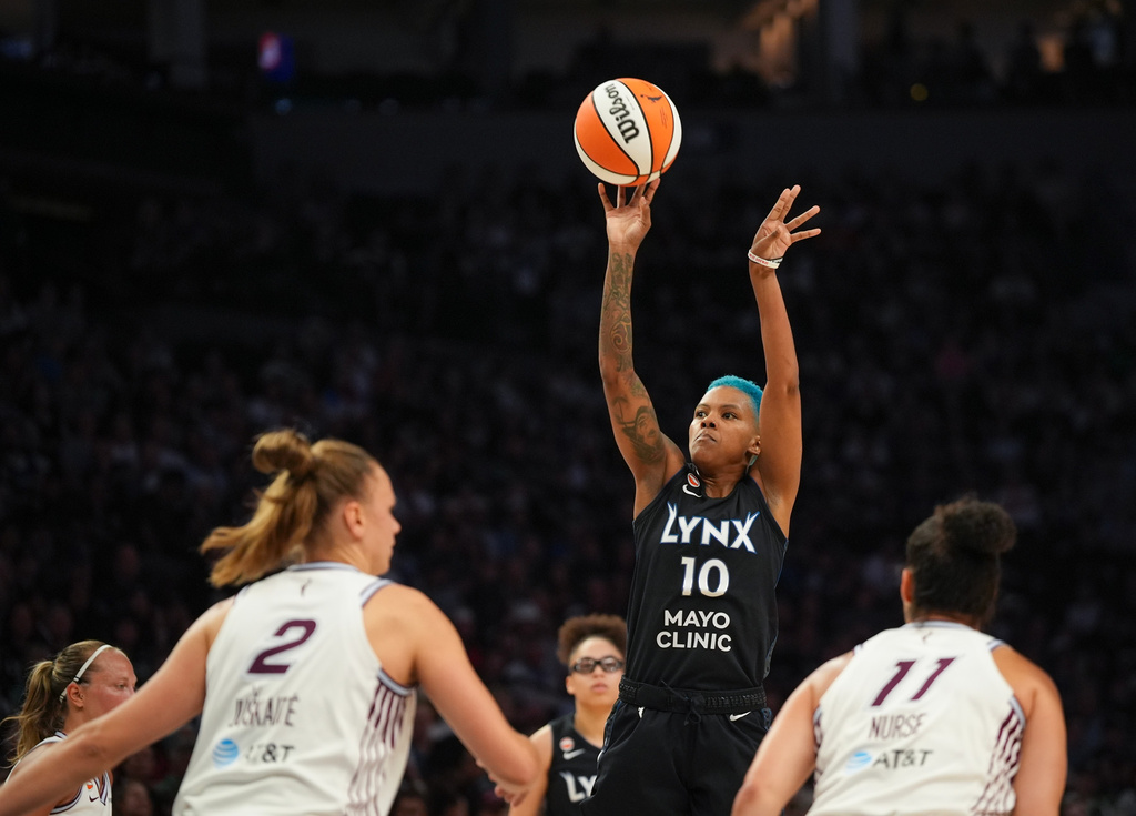 Minnesota Lynx guard Courtney Williams (10) shoots a successful three pointer in the second quarter of a WNBA basketball game Tuesday, July 28, 2026, in Minneapolis. (Jeff Wheeler/Minnesota Star Tribune via AP)