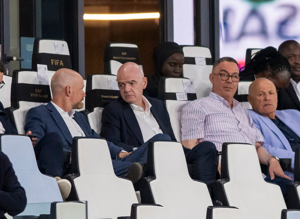 FIFA president Gianni Infantino and president of Moroccan Royal Football Federation Fouzi Lekjaa attend a Women's AFCON 2026 soccer match between Malawi and Zambia, in Rabat, Morocco, Wednesday, Aug. 5, 2026. (AP Photo)