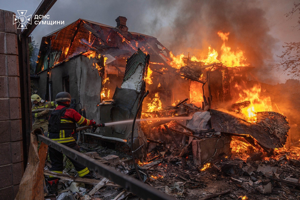 In this photo provided by the Ukrainian Emergency Service, firefighters put out a fire at private homes following a Russian air attack in Sumy, Ukraine, Wednesday, Sept. 16, 2026. (Ukrainian Emergency Service via AP)
