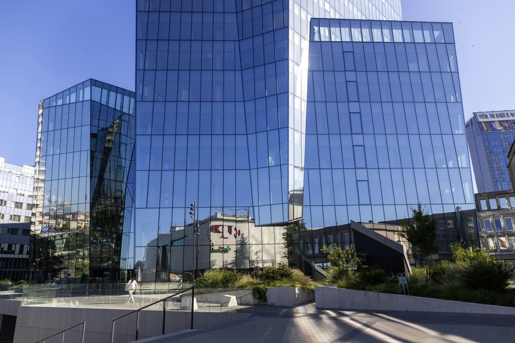 The building that houses on its ground floor, the Lithuanian bank UAB "Urbo bankas" which was imposed sanctions by the Chinese Ministry of Commerce, in Vilnius, Lithuania, Thursday, Aug. 14, 2025. (AP Photo/Mindaugas Kulbis)