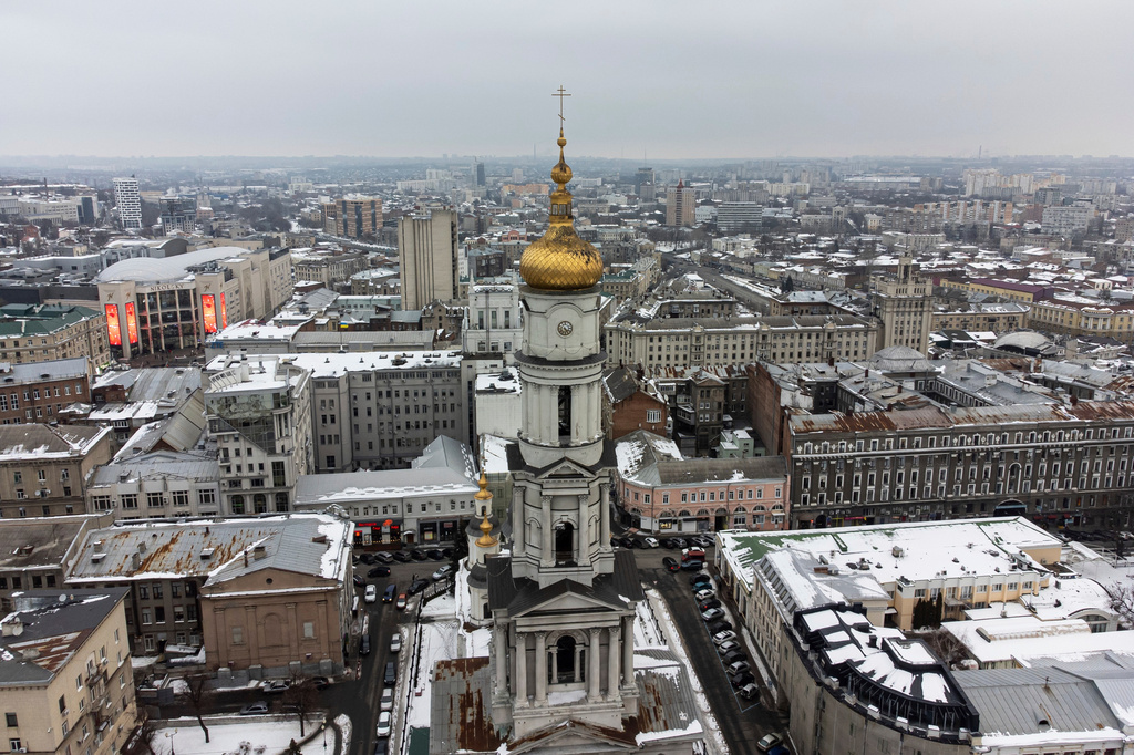 FILE - The Assumption or Dormition Cathedral, the main Orthodox church of Kharkov rises above the center of Kharkiv, Ukraine's second-largest city in Ukraine, Friday, Feb. 4, 2022. (AP Photo/Evgeniy Maloletka, File)
